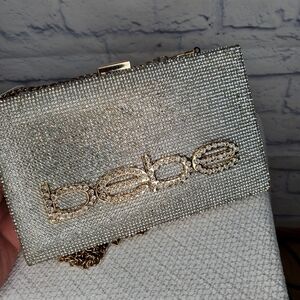Bebe Sparkling Silver Clutch with Gold Accents